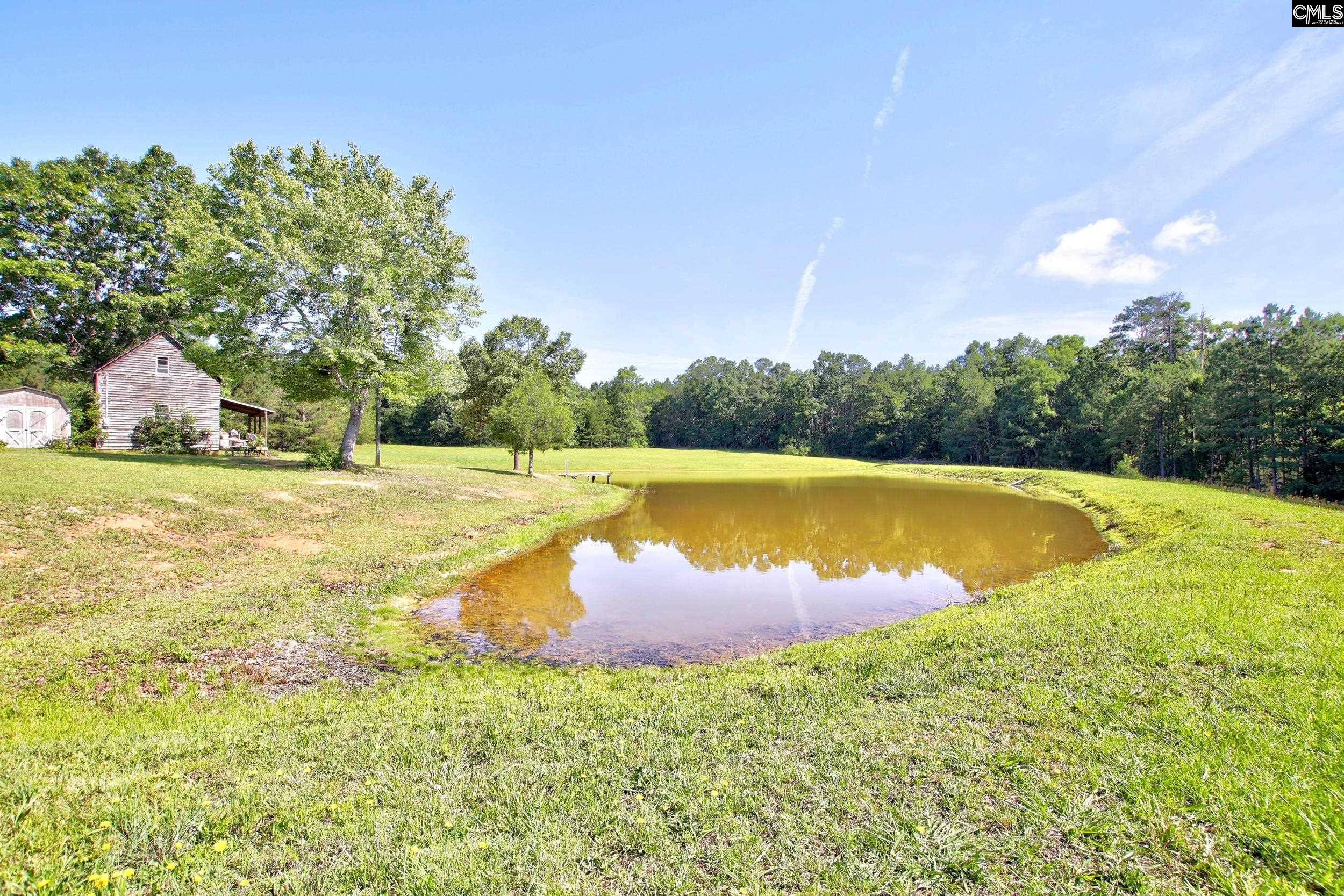 3140 Highway 702 Chappells, SC 29037 - Photo 10 of 39 a view of a swimming pool and an outdoor space