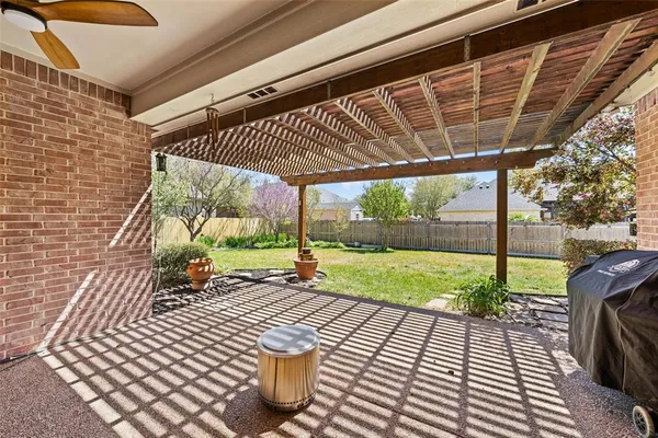 a view of a porch with wooden floor