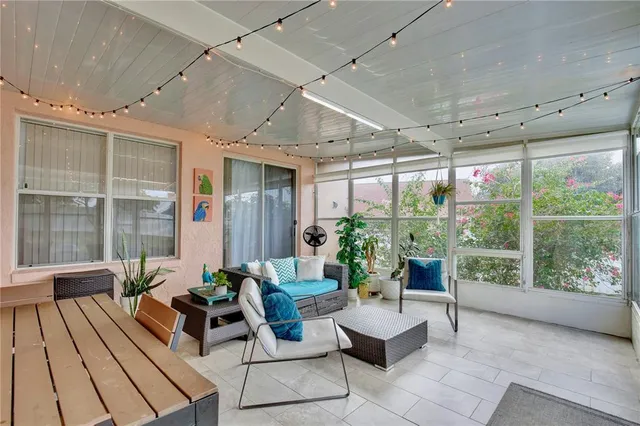 a view of a house with swimming pool and a yard