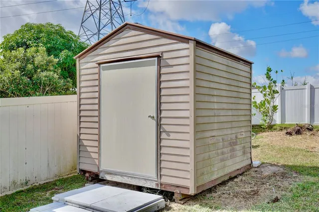 an aerial view of house with yard