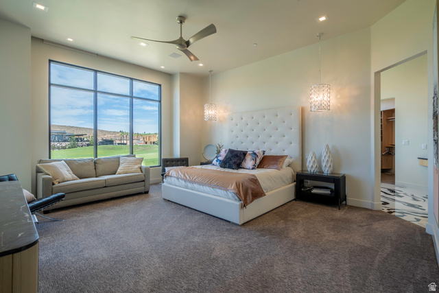 3606 South Cypress Road Hurricane, UT 84737 - Photo 27 of 69 Bedroom with carpet flooring, ceiling fan, and hanging lights