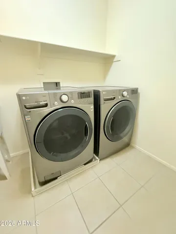 a view of a balcony with chairs