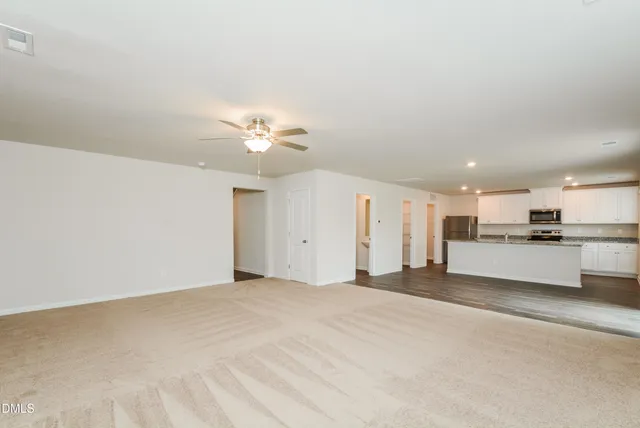 a view of a kitchen with a sink and cabinet area