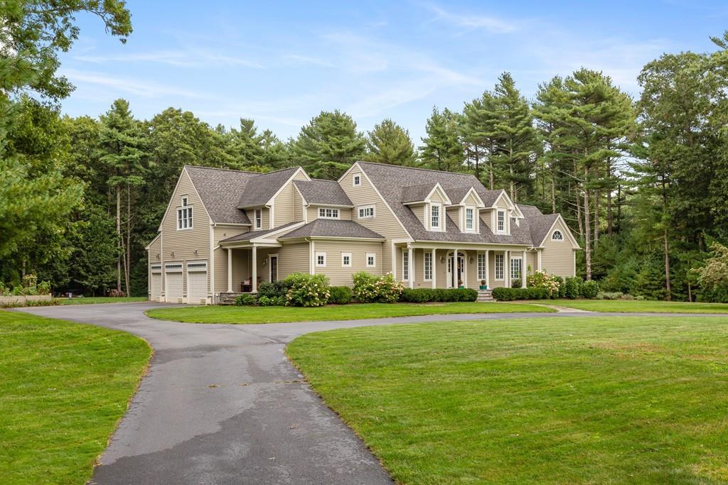 77 Hiller Road Rochester, MA 02770 - Photo 1 of 33 a front view of a house with a yard