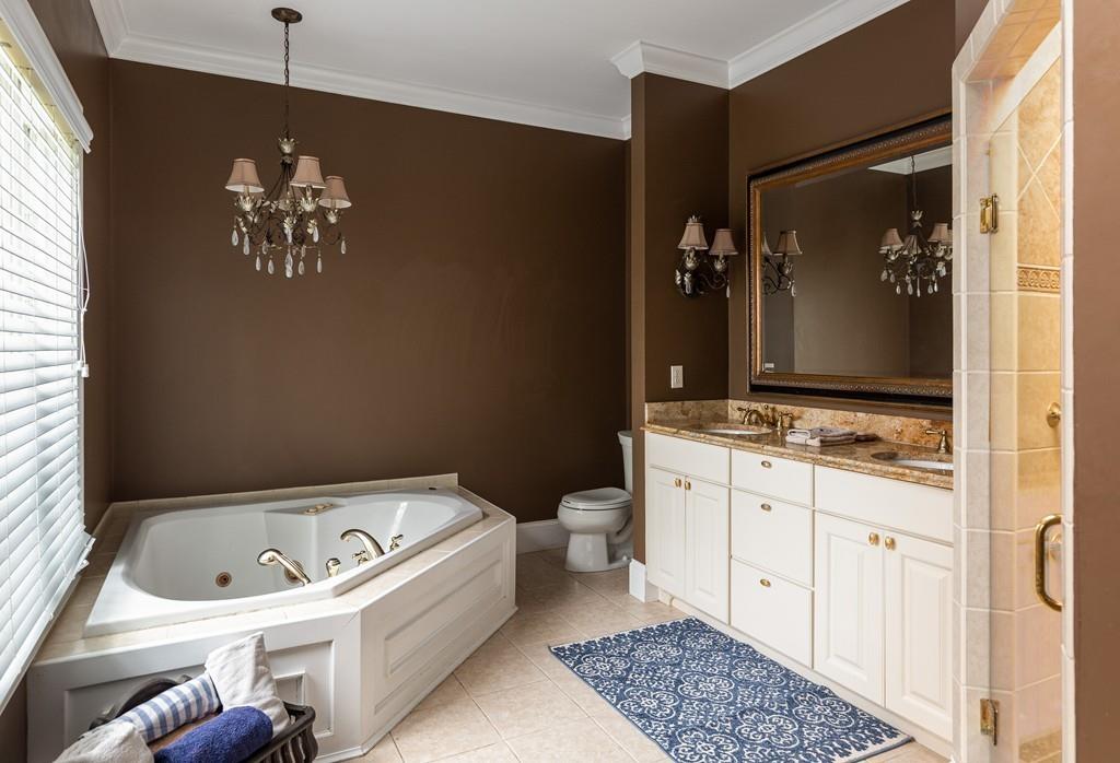 77 Hiller Road Rochester, MA 02770 - Photo 19 of 33 a bathroom with a tub sink and mirror