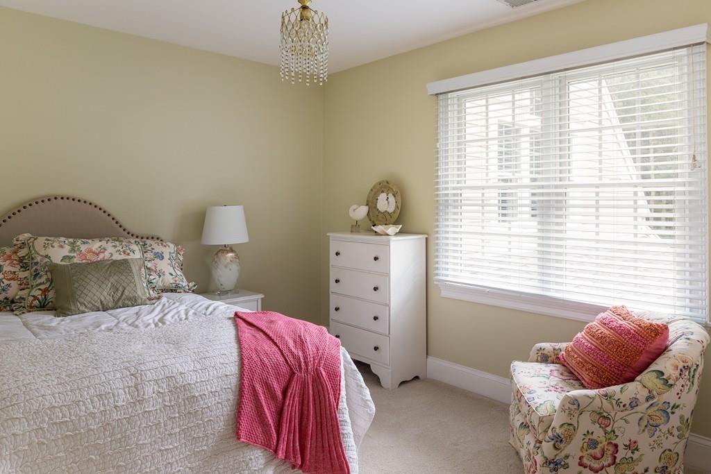 77 Hiller Road Rochester, MA 02770 - Photo 21 of 33 a bedroom with a bed and window