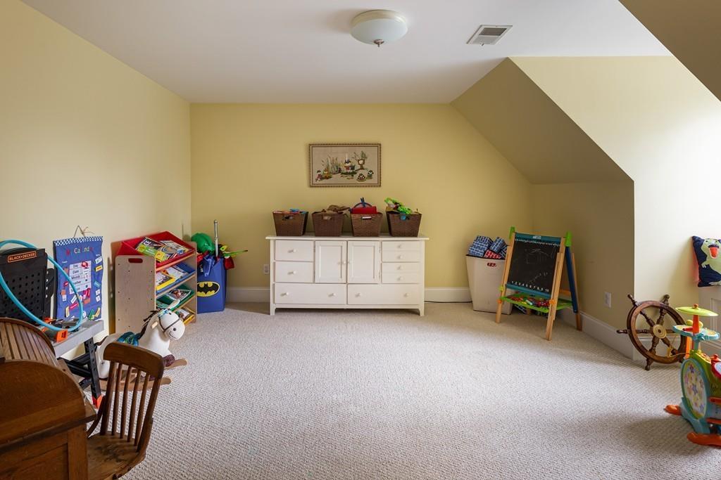 77 Hiller Road Rochester, MA 02770 - Photo 26 of 33 a view of a bedroom with baby toys