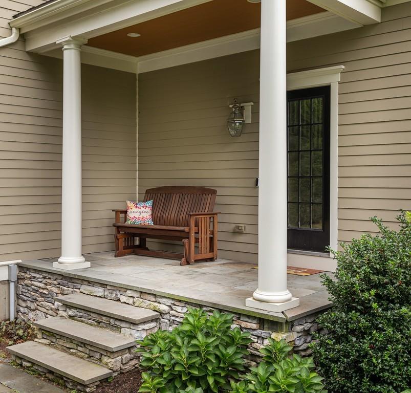 77 Hiller Road Rochester, MA 02770 - Photo 30 of 33 a bench sitting in front of a door
