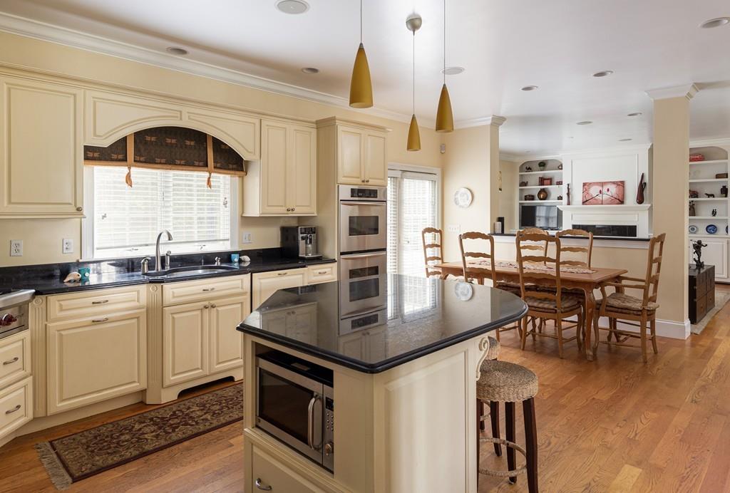 77 Hiller Road Rochester, MA 02770 - Photo 3 of 33 a kitchen with stainless steel appliances granite countertop a stove and a sink