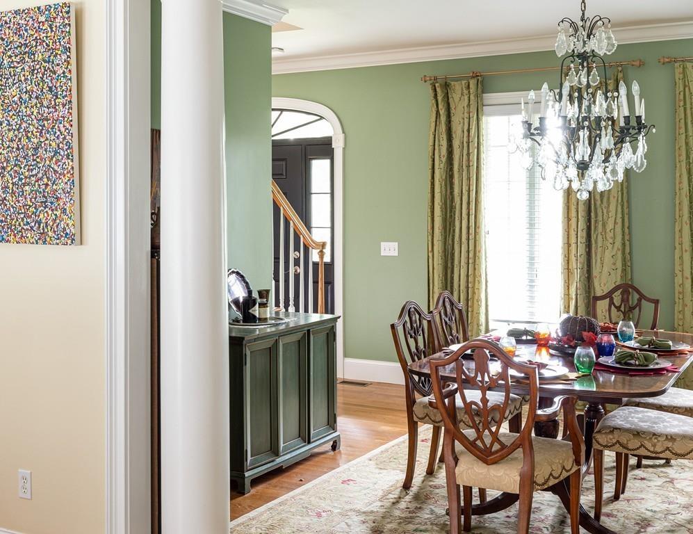 77 Hiller Road Rochester, MA 02770 - Photo 10 of 33 a view of a dining room with furniture and chandelier