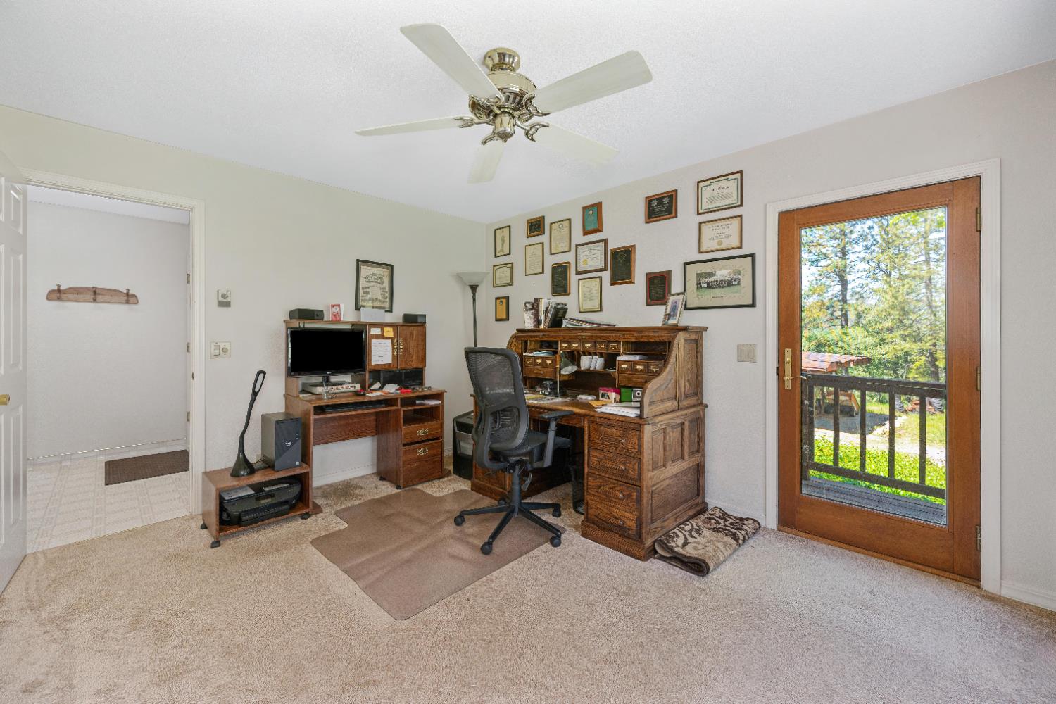 5215 Faraway Road Greenwood, CA 95635 - Photo 22 of 46 office with light colored carpet and a ceiling fan