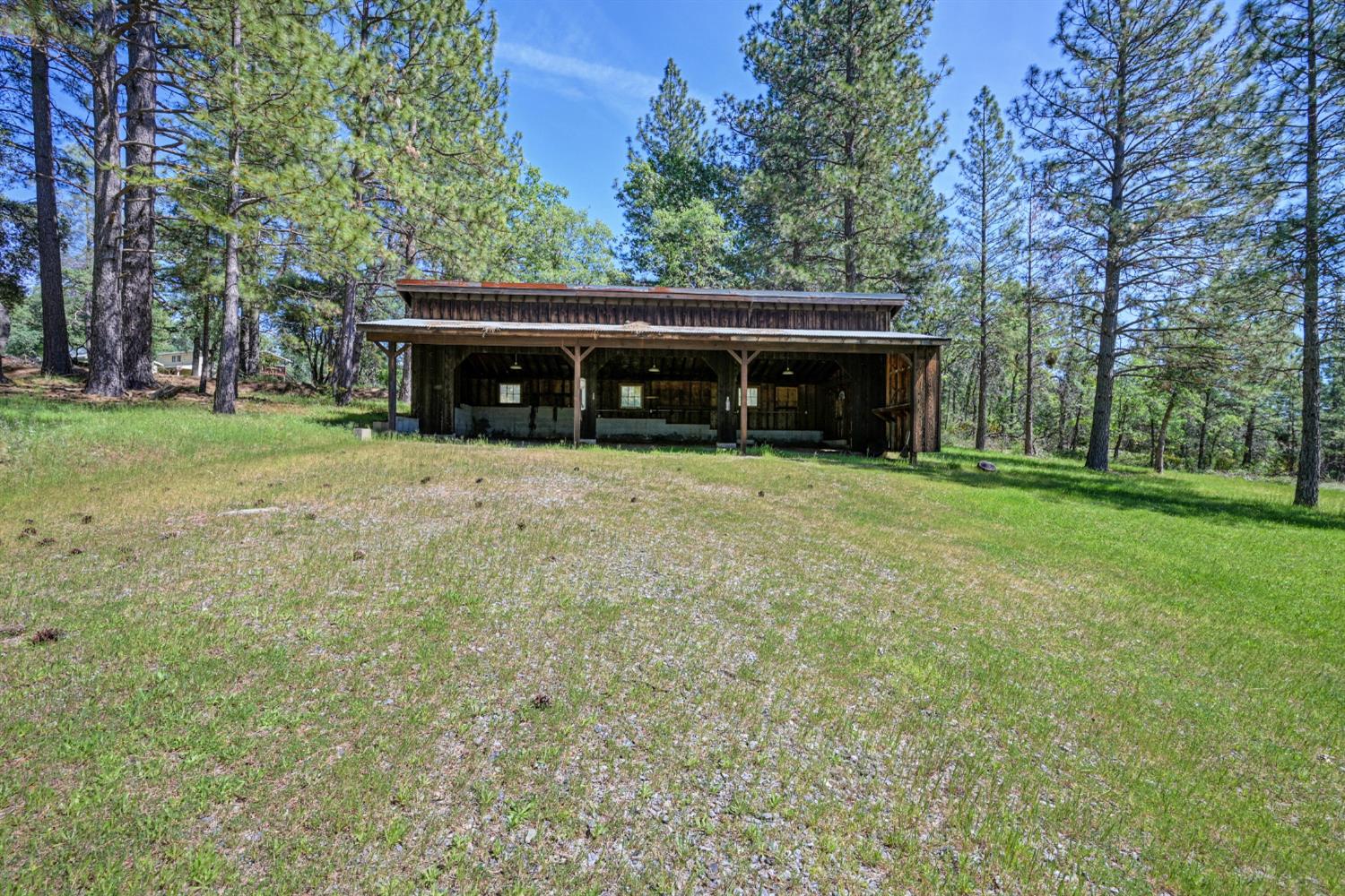 5215 Faraway Road Greenwood, CA 95635 - Photo 31 of 46 view of outdoor structure featuring view of wooded area