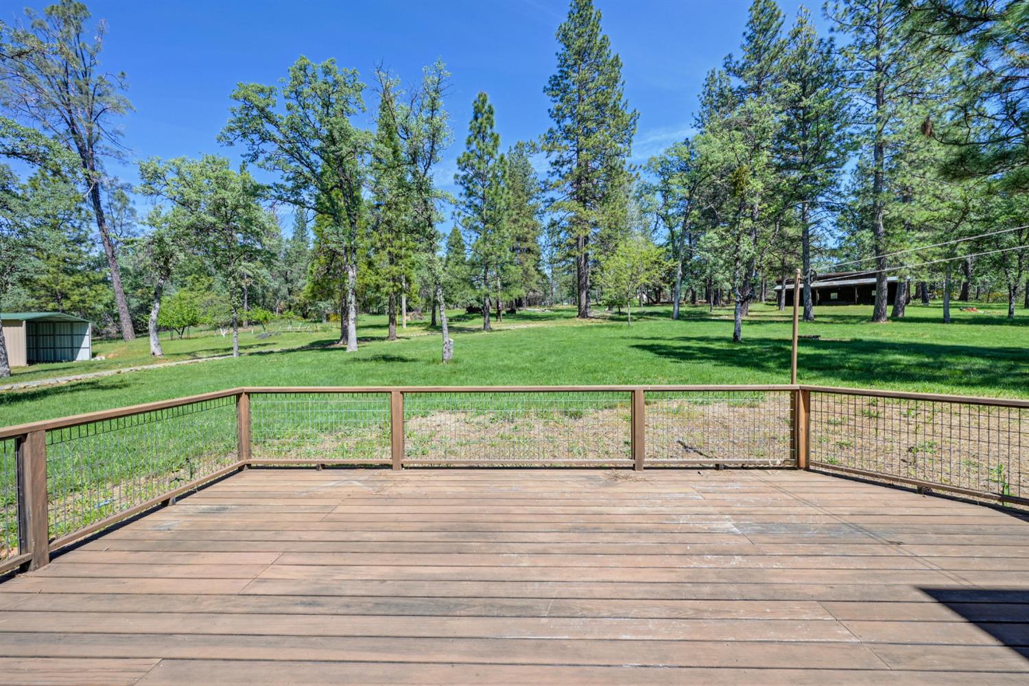 5215 Faraway Road Greenwood, CA 95635 - Photo 43 of 46 wooden deck featuring a lawn