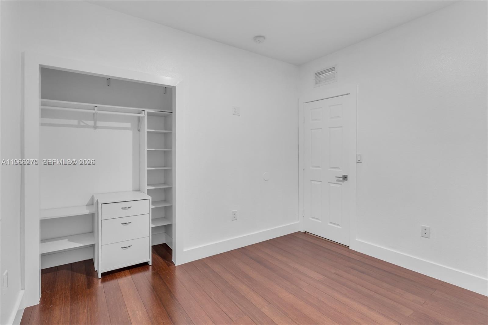 30 Southeast 6th Road Homestead, FL 33030 - Photo 18 of 34 a view of an empty walk in closet