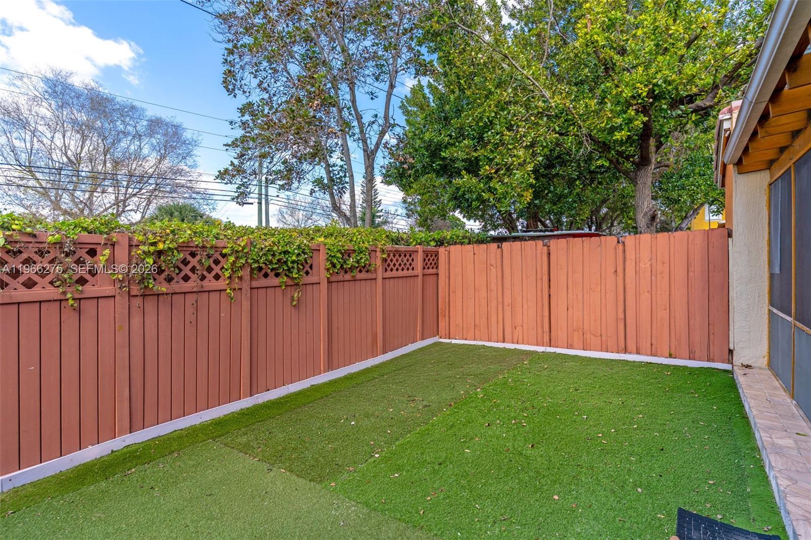 30 Southeast 6th Road Homestead, FL 33030 - Photo 27 of 34 a view of yard with wooden fence