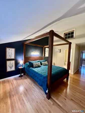 a view of livingroom with furniture wooden floor and window