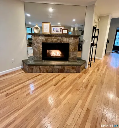 a living room with a fireplace