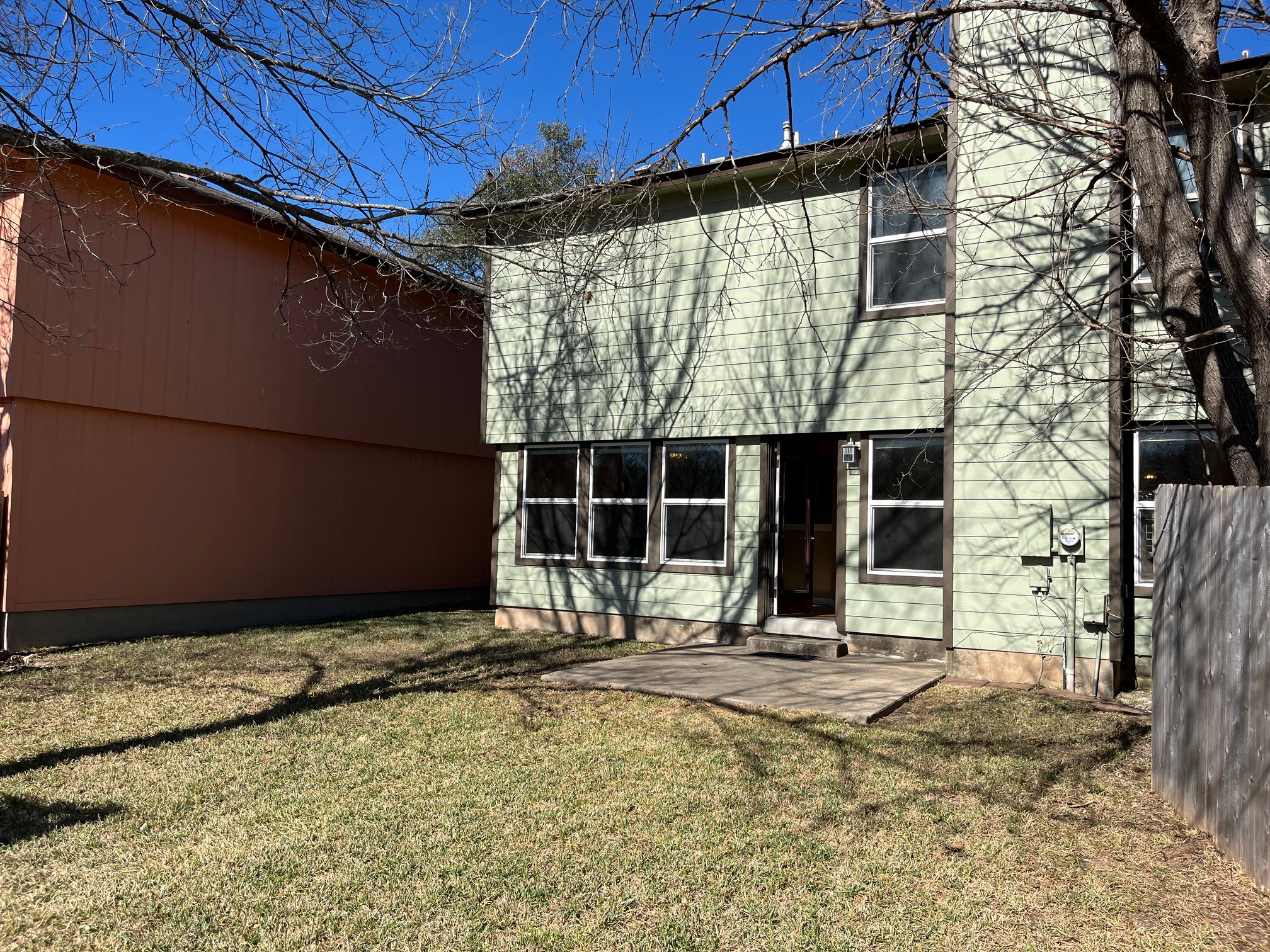 12919 Marimba Trail Austin, TX 78729 - Photo 3 of 20 Back of property featuring a patio