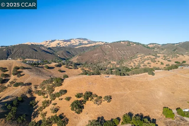 a view of a backyard of a house