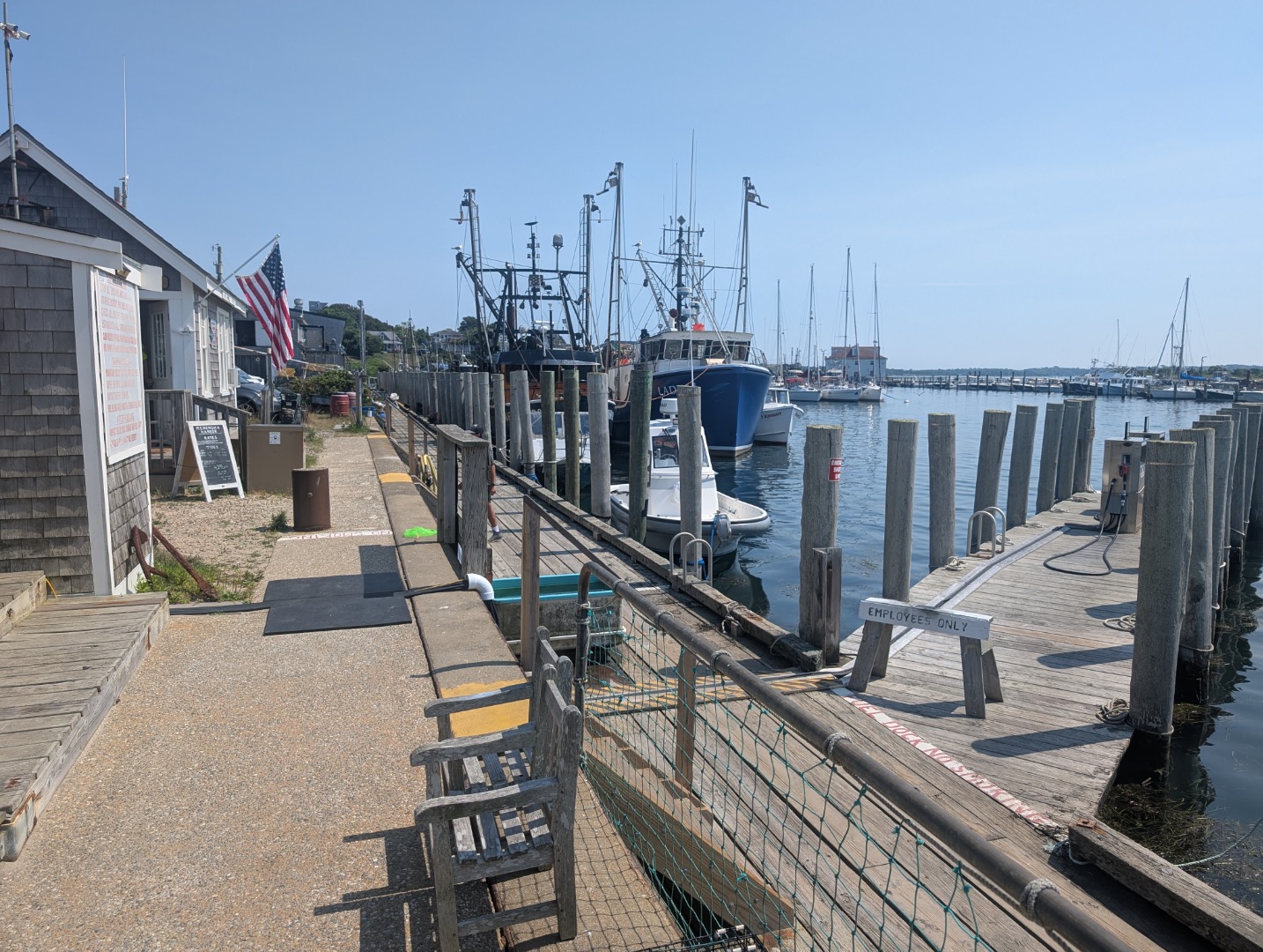 14 Ridge Road Aquinnah, MA 02535 - Photo 10 of 16 a view of a balcony with wooden floor and iron fence