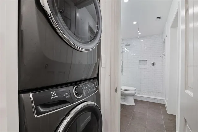 a view of a park with large trees