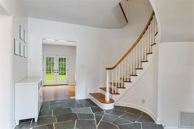 a view of a kitchen from the hallway