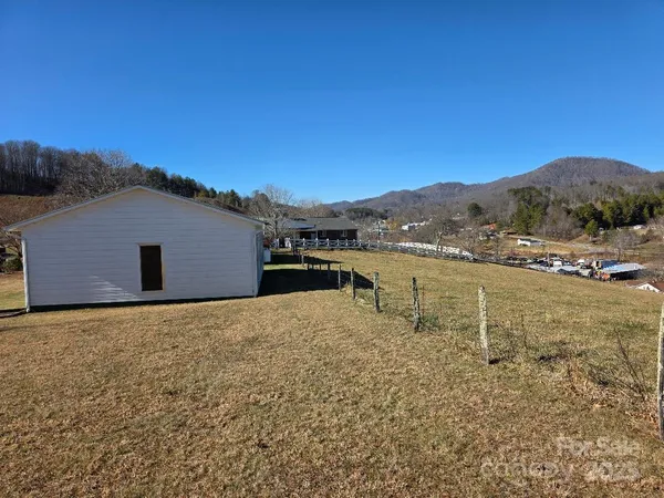 a view of a yard with an outdoor space