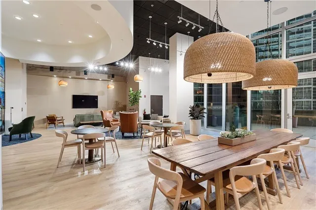 a living room with a table or chairs and a wooden floor