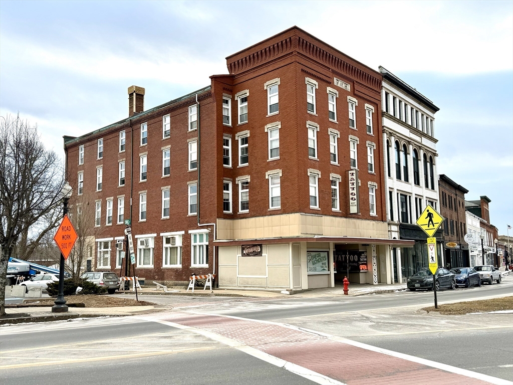 2-6 North Main Street Rochester, NH 03867 - Photo 1 of 40 a front view of a building with street view and building