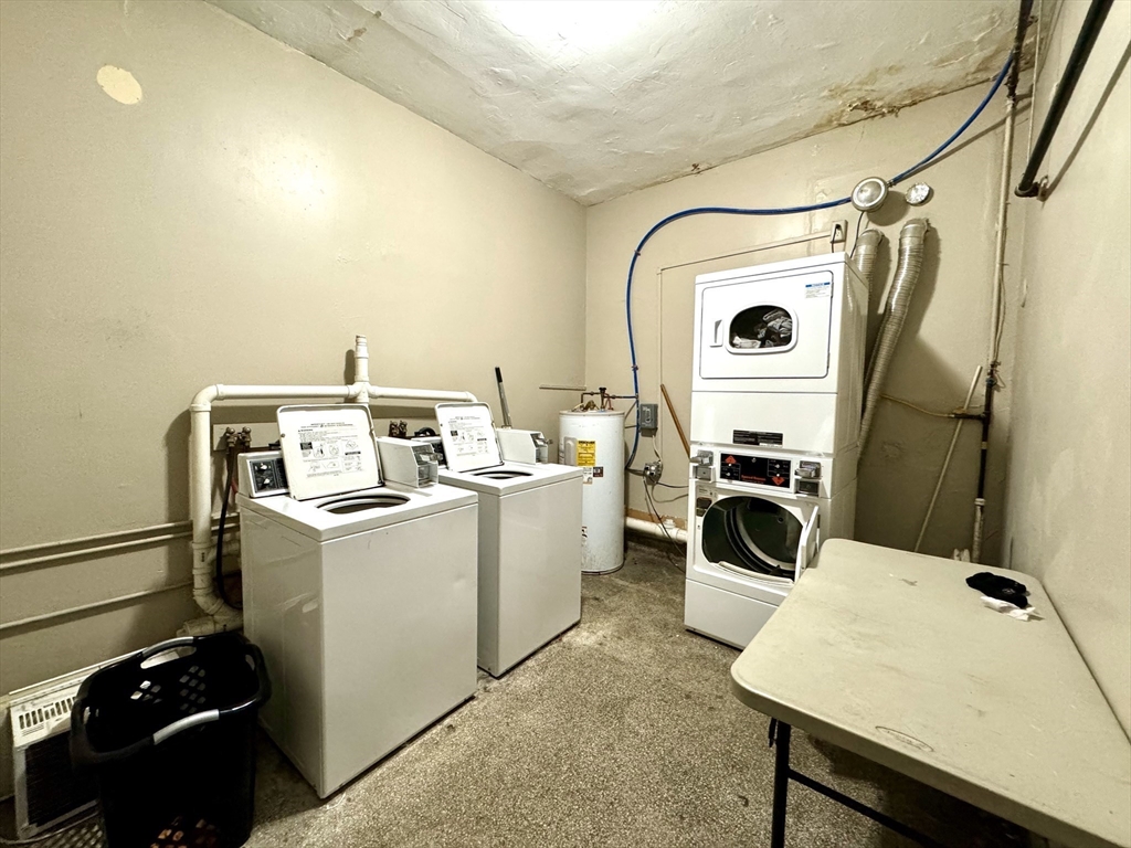 2-6 North Main Street Rochester, NH 03867 - Photo 14 of 40 a utility room with dryer and washer