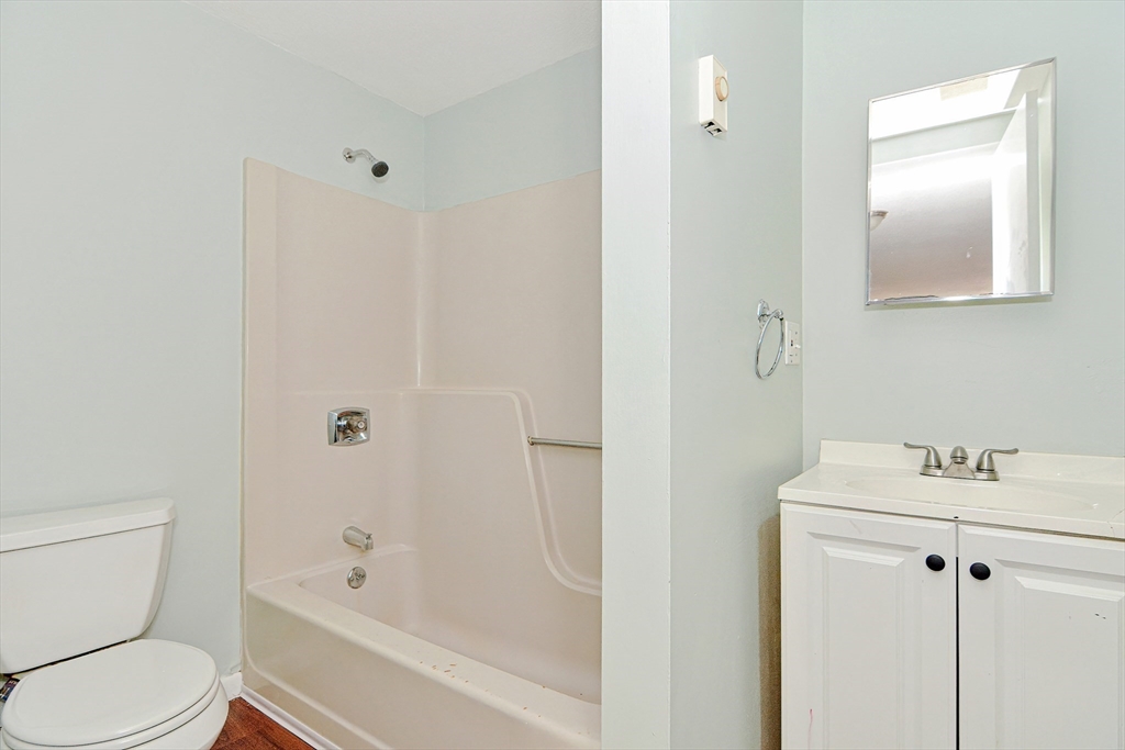 2-6 North Main Street Rochester, NH 03867 - Photo 31 of 40 a bathroom with a sink toilet and shower