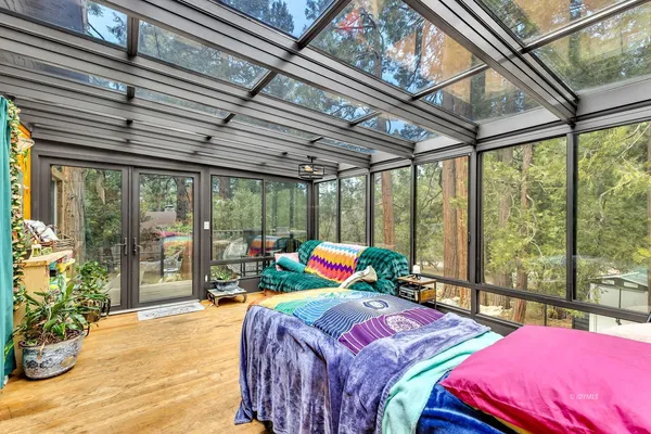 a kitchen with stainless steel appliances granite countertop a refrigerator and a stove