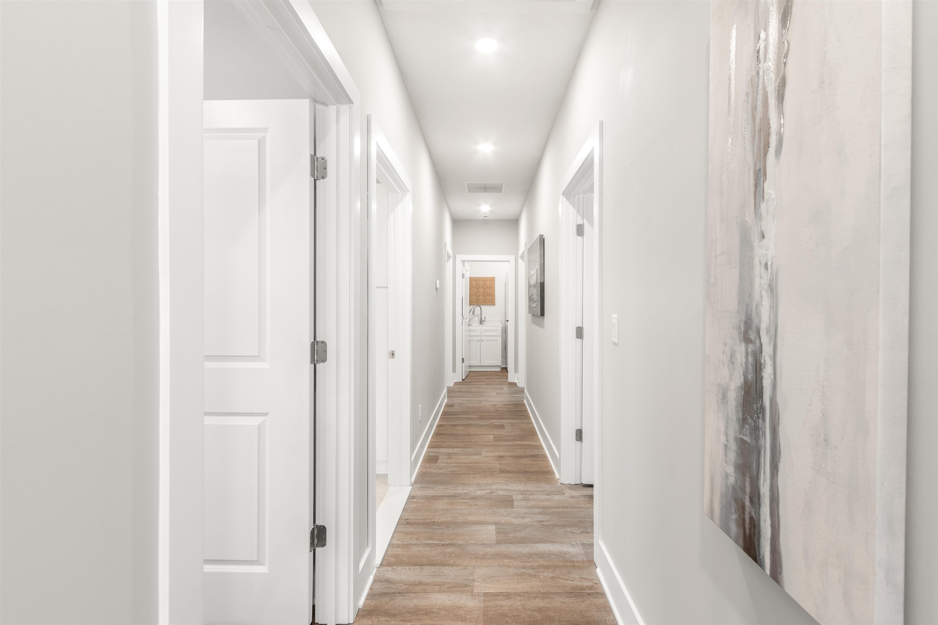 6779 Magnolia Lane St. Augustine, FL 32086 - Photo 17 of 61 a view of a hallway with wooden floor