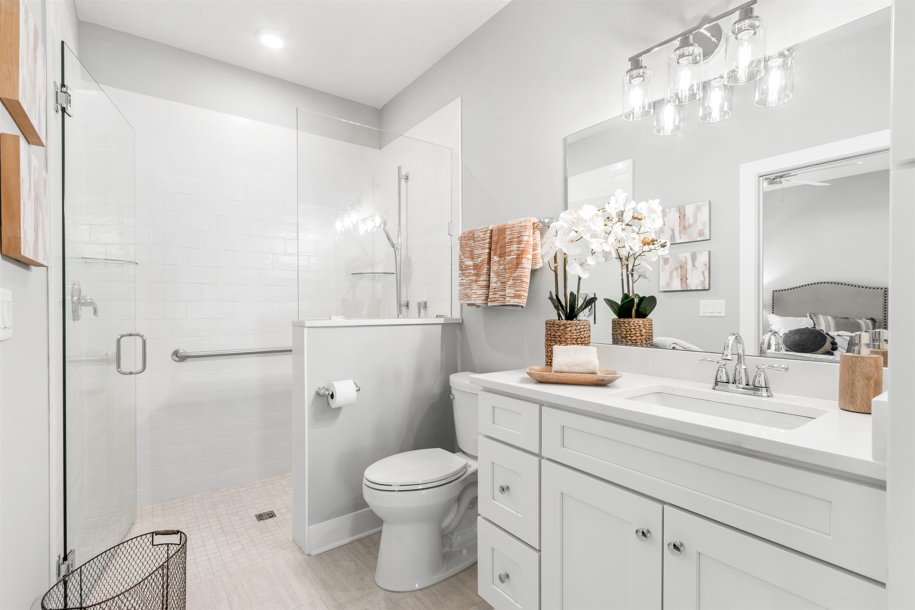 6779 Magnolia Lane St. Augustine, FL 32086 - Photo 20 of 61 a bathroom with a sink a toilet and shower