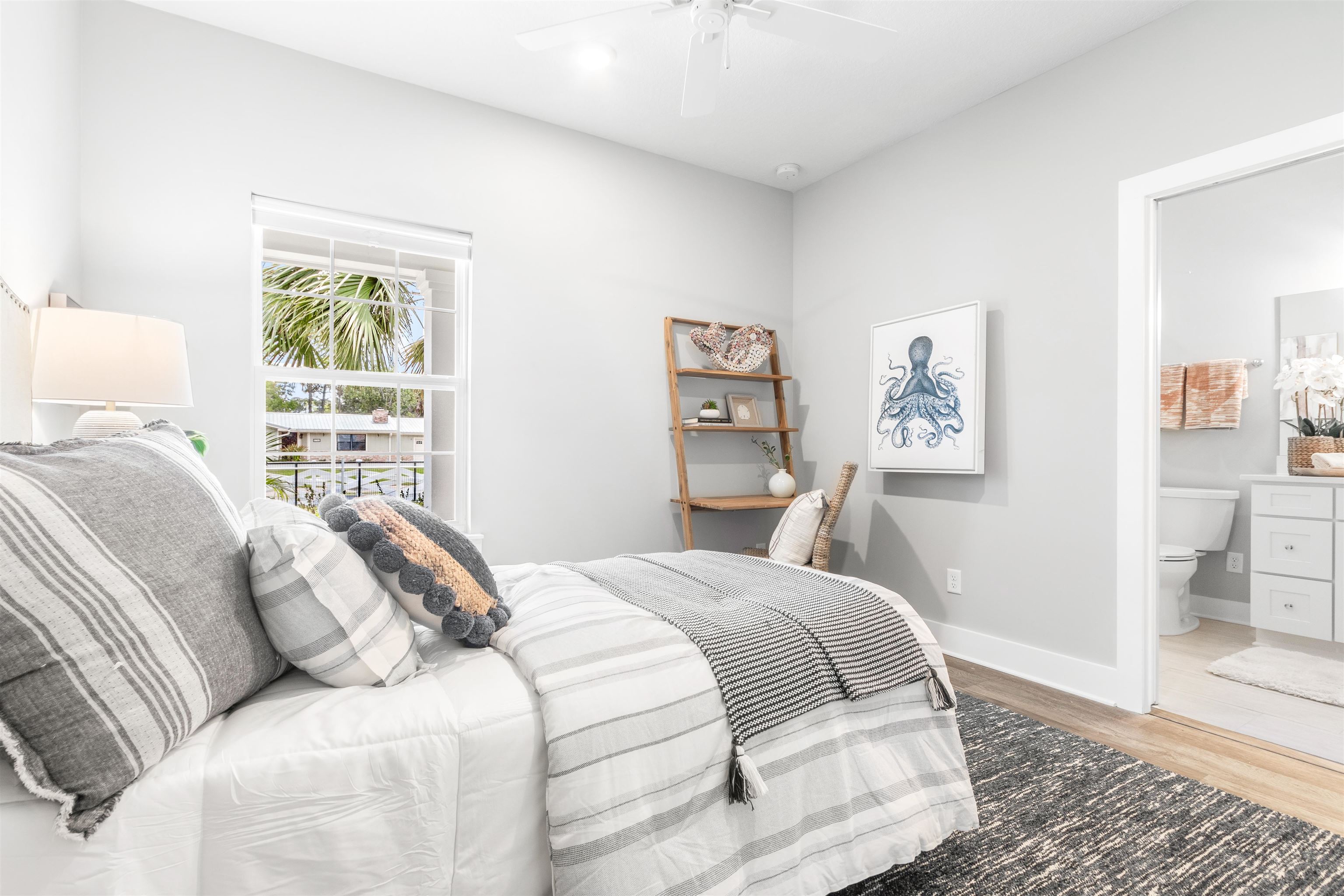 6779 Magnolia Lane St. Augustine, FL 32086 - Photo 23 of 61 a bedroom with a bed and a window