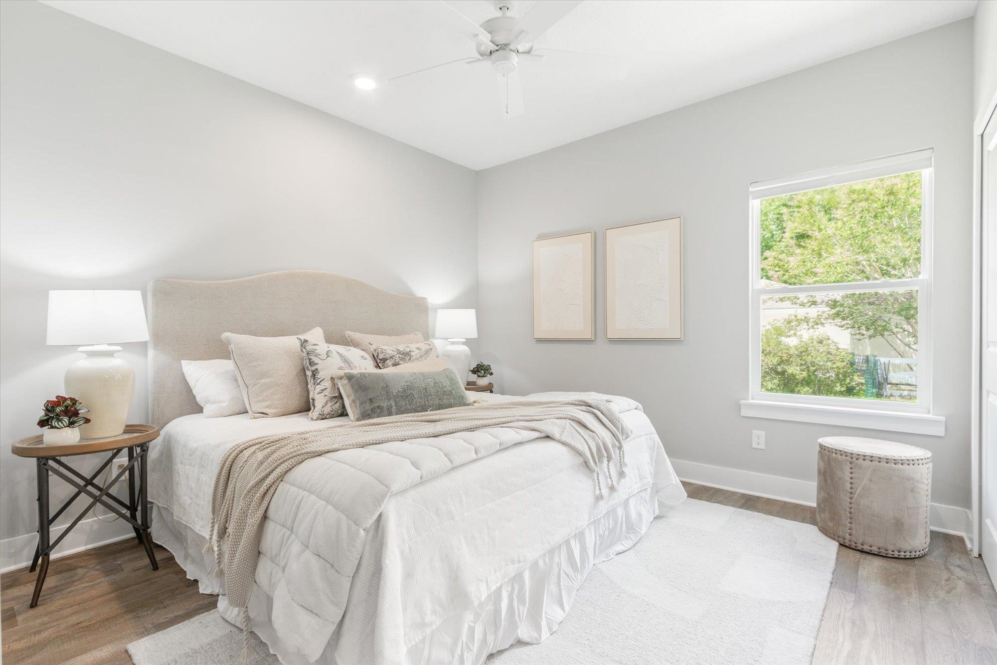 6779 Magnolia Lane St. Augustine, FL 32086 - Photo 28 of 61 a bedroom with a large bed and a window