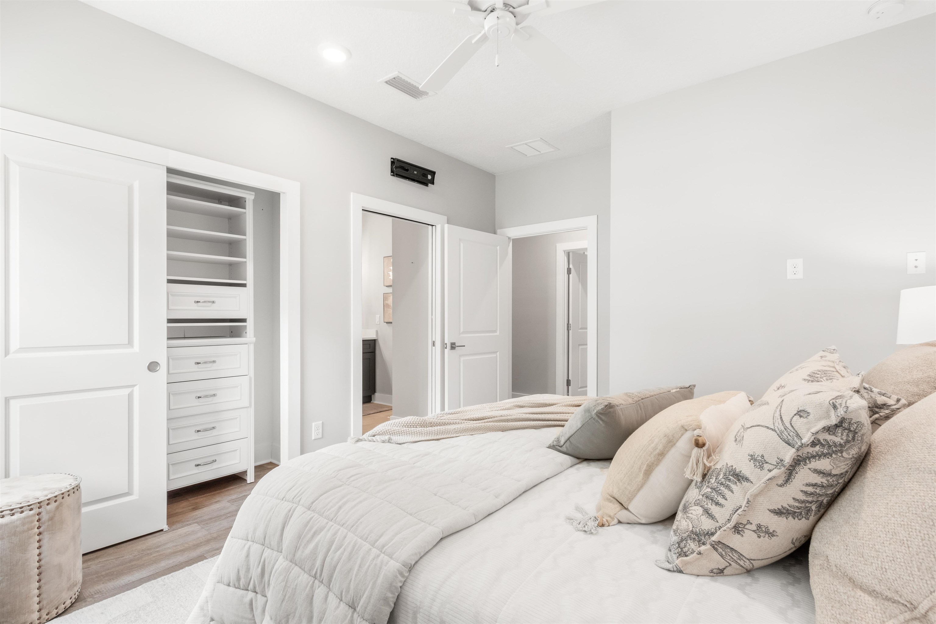 6779 Magnolia Lane St. Augustine, FL 32086 - Photo 29 of 61 a bedroom with a bed and a walk in closet