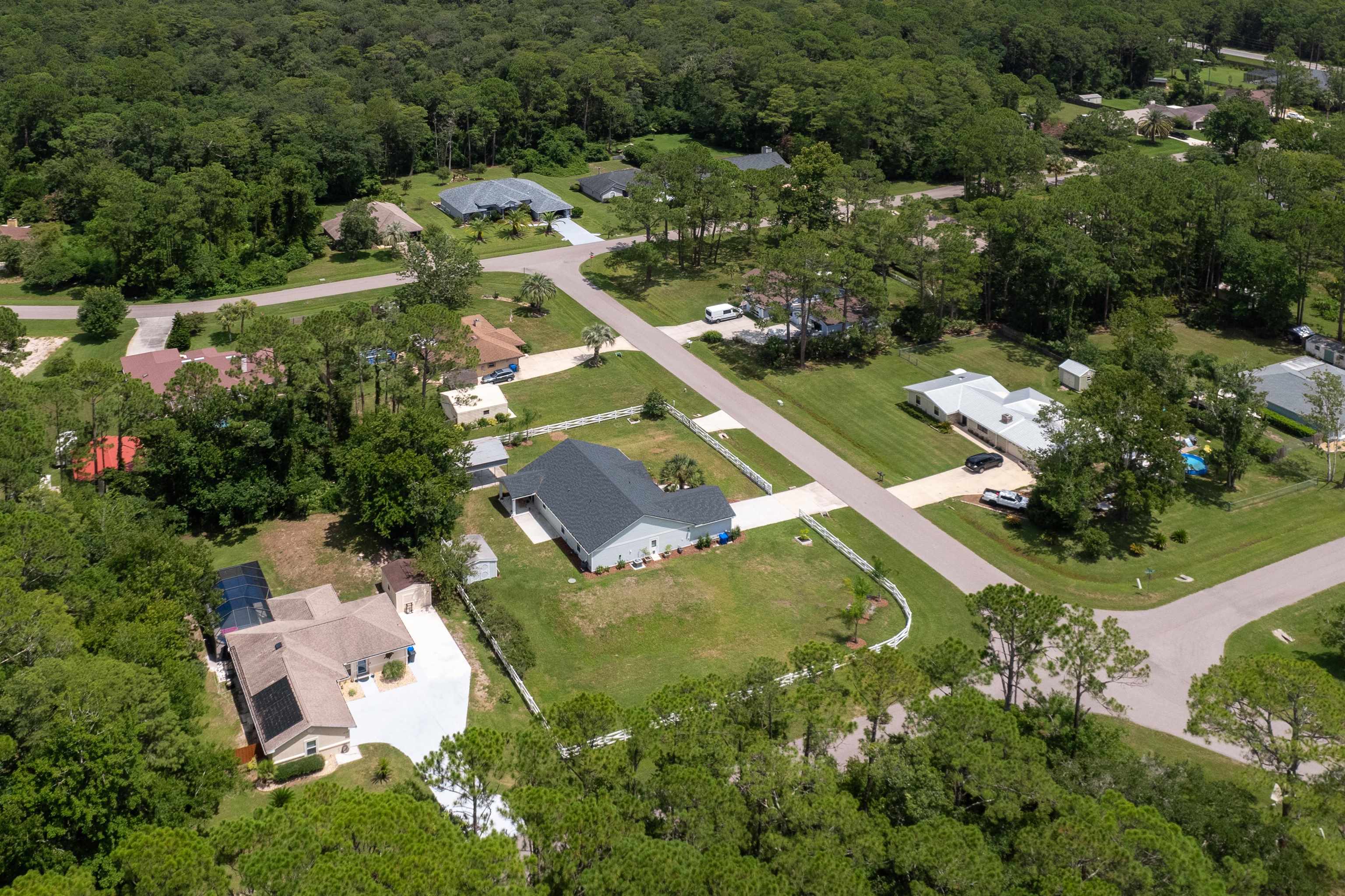6779 Magnolia Lane St. Augustine, FL 32086 - Photo 50 of 61 an aerial view of a house with a yard basket ball court and outdoor seating