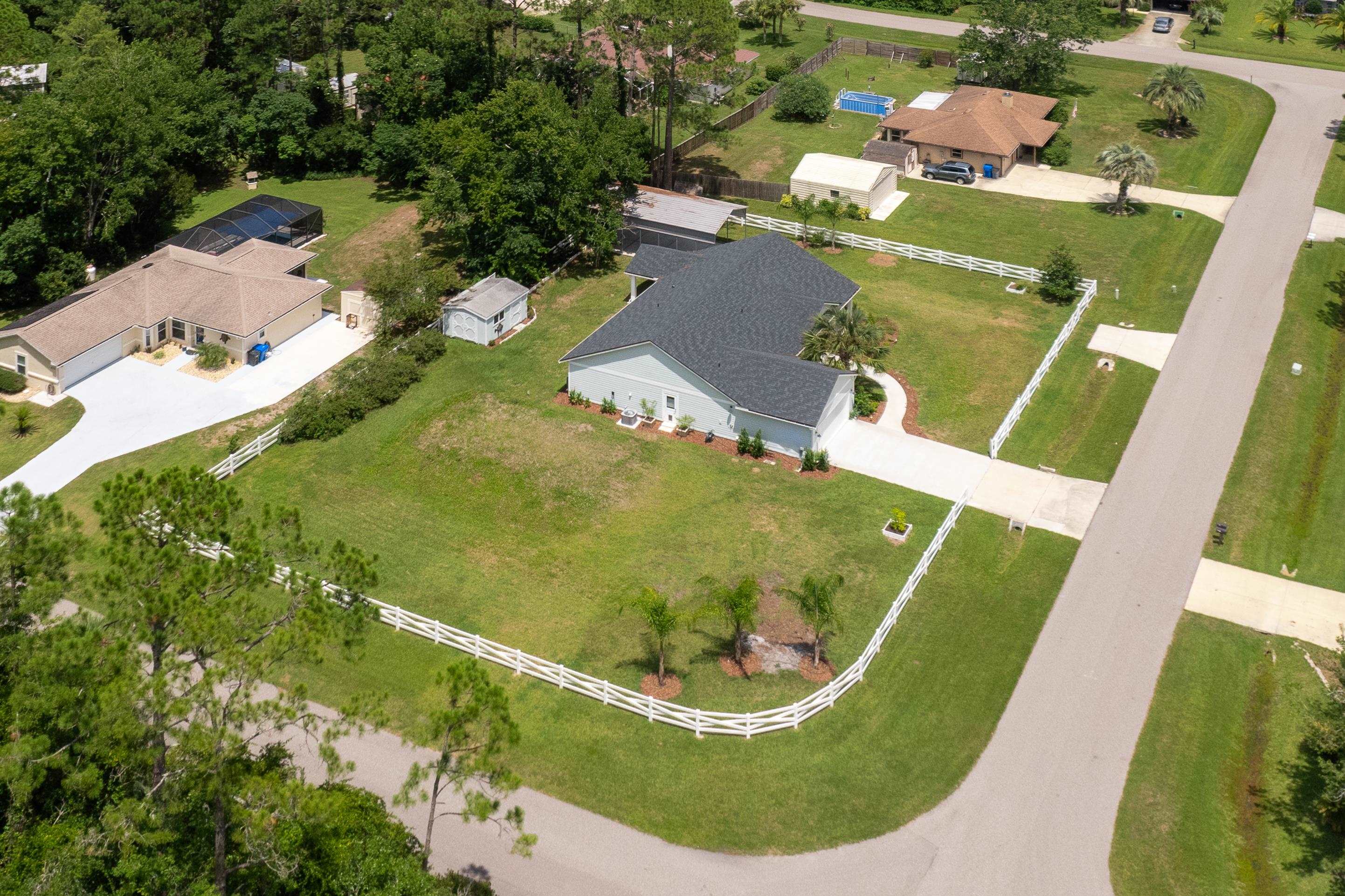 6779 Magnolia Lane St. Augustine, FL 32086 - Photo 54 of 61 an aerial view of a house
