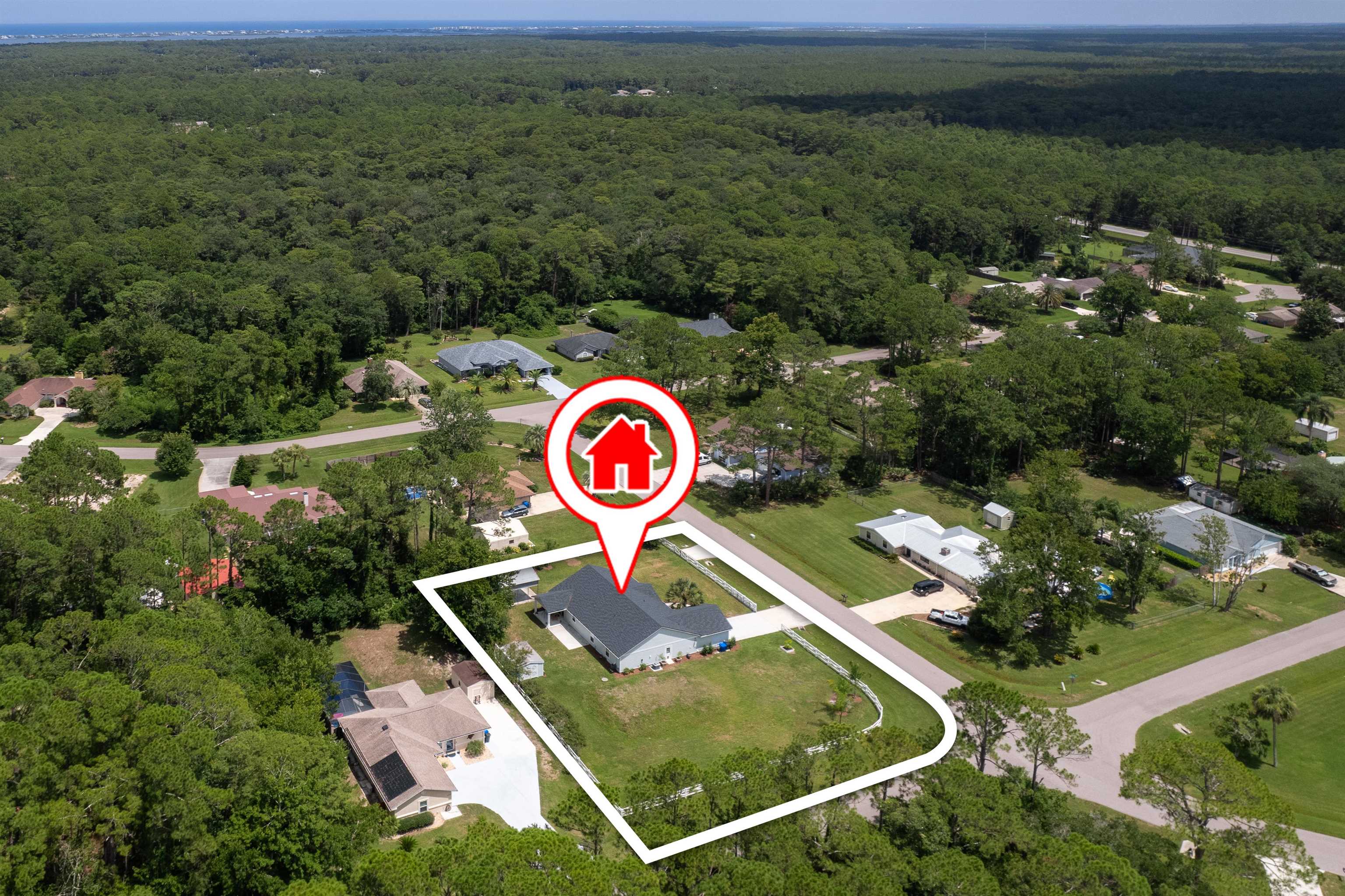 6779 Magnolia Lane St. Augustine, FL 32086 - Photo 55 of 61 Aerial view of property and surrounding area featuring property boundaries highlighted and nearby suburban area