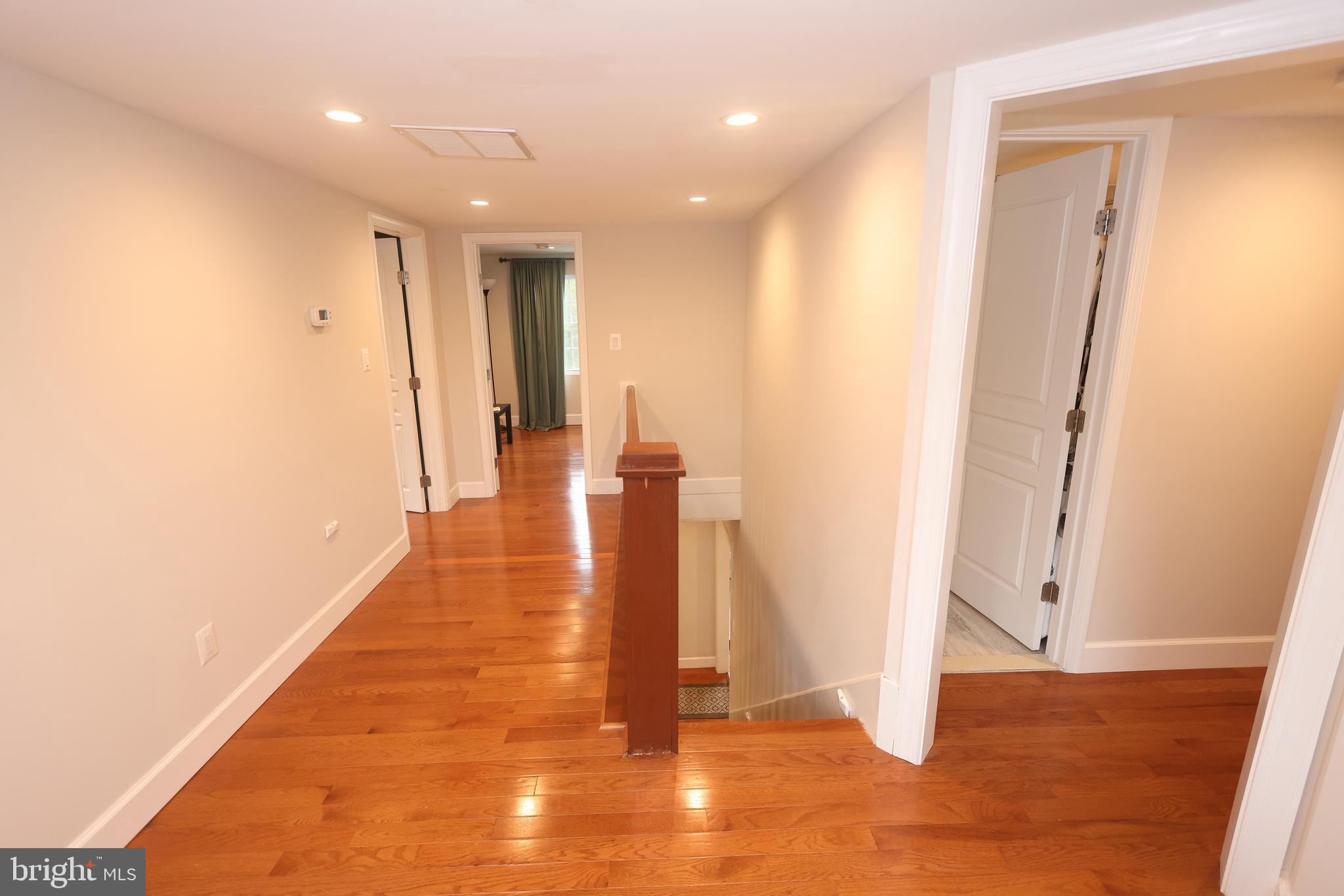 16600 Bald Eagle School Road Brandywine, MD 20613 - Photo 15 of 29 a view of a hallway with wooden floor