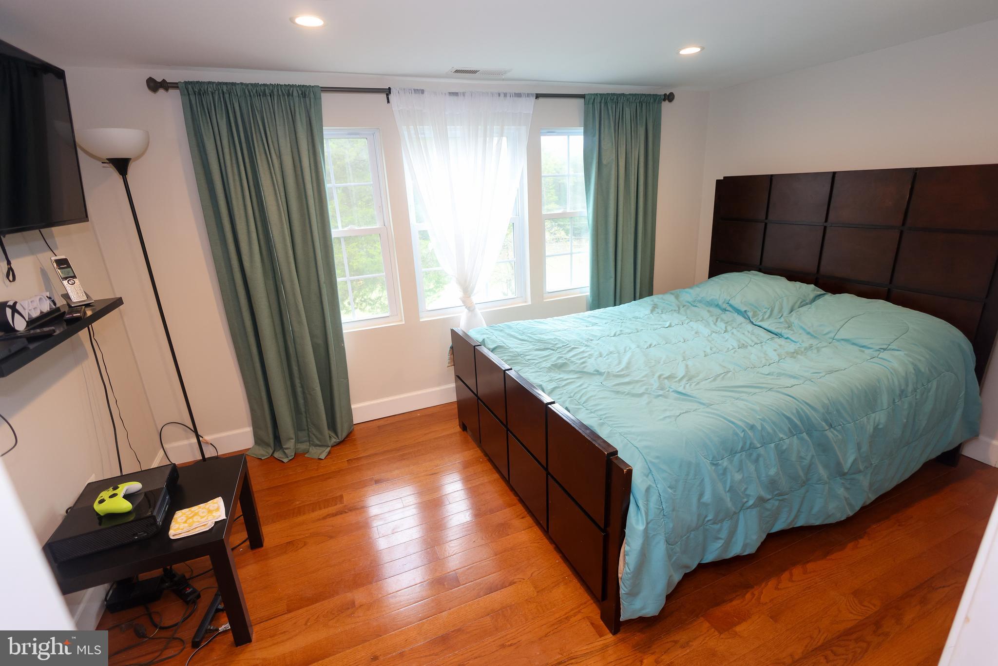 16600 Bald Eagle School Road Brandywine, MD 20613 - Photo 17 of 29 a bed sitting in a bedroom next to a window