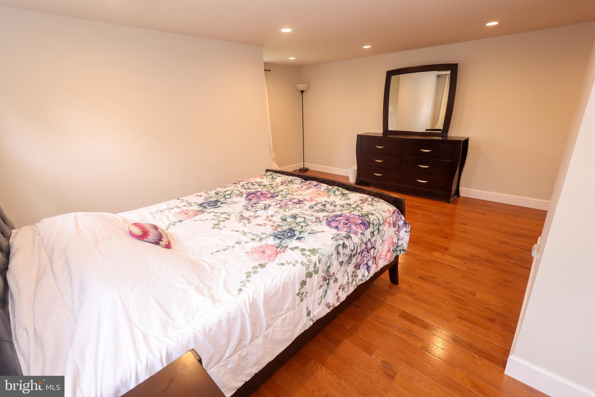 16600 Bald Eagle School Road Brandywine, MD 20613 - Photo 27 of 29 a bedroom with a bed and a dresser