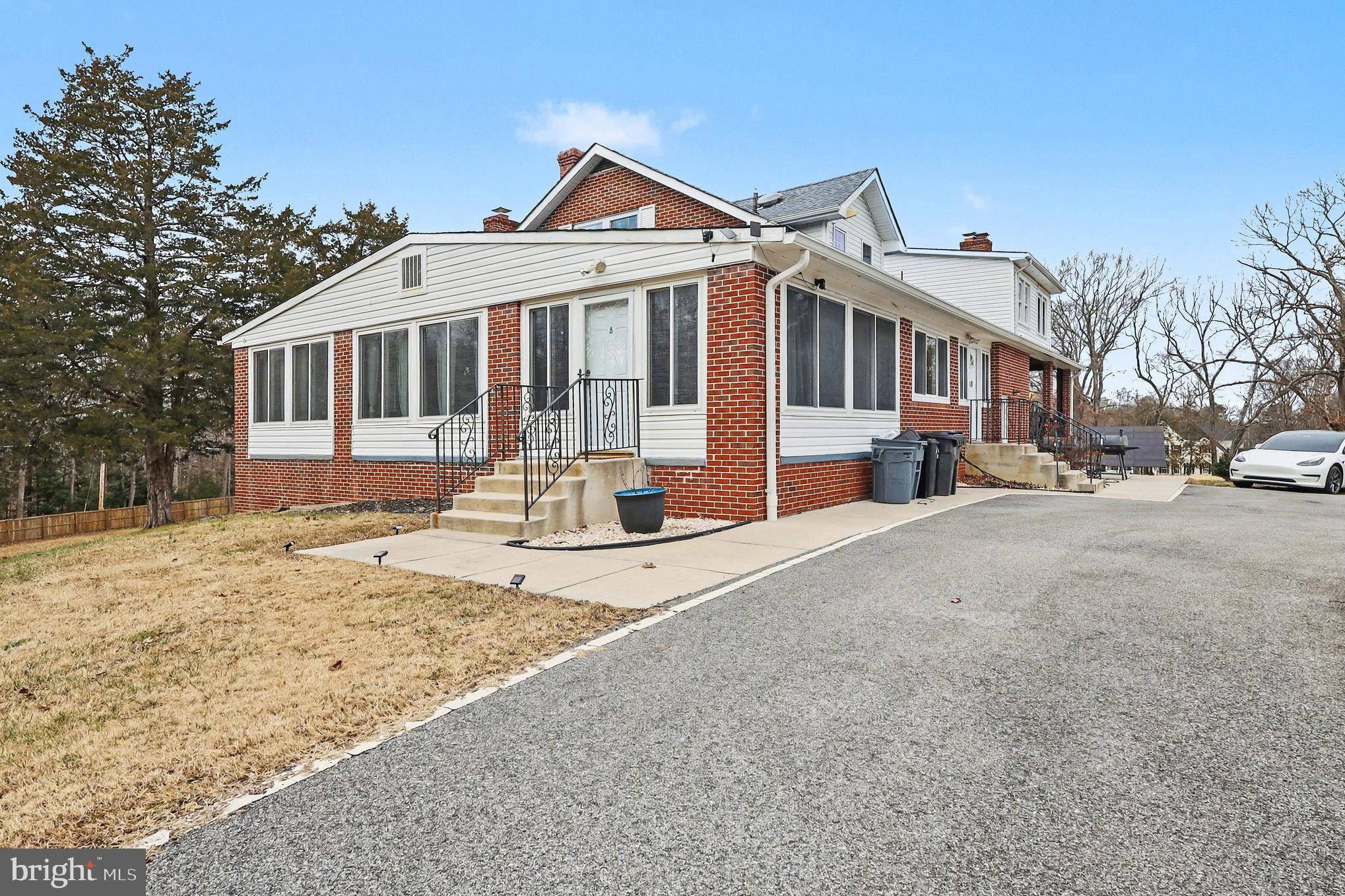 16600 Bald Eagle School Road Brandywine, MD 20613 - Photo 28 of 29 a front view of a house with a yard