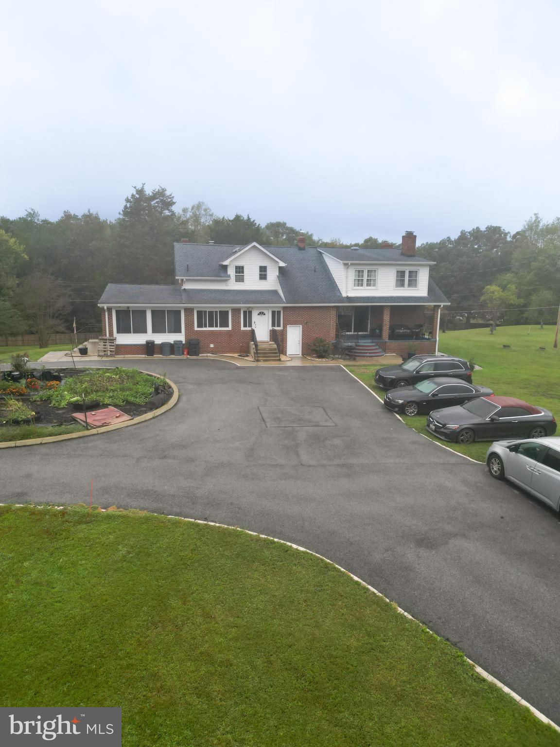 16600 Bald Eagle School Road Brandywine, MD 20613 - Photo 29 of 29 an aerial view of a house with a garden and trees