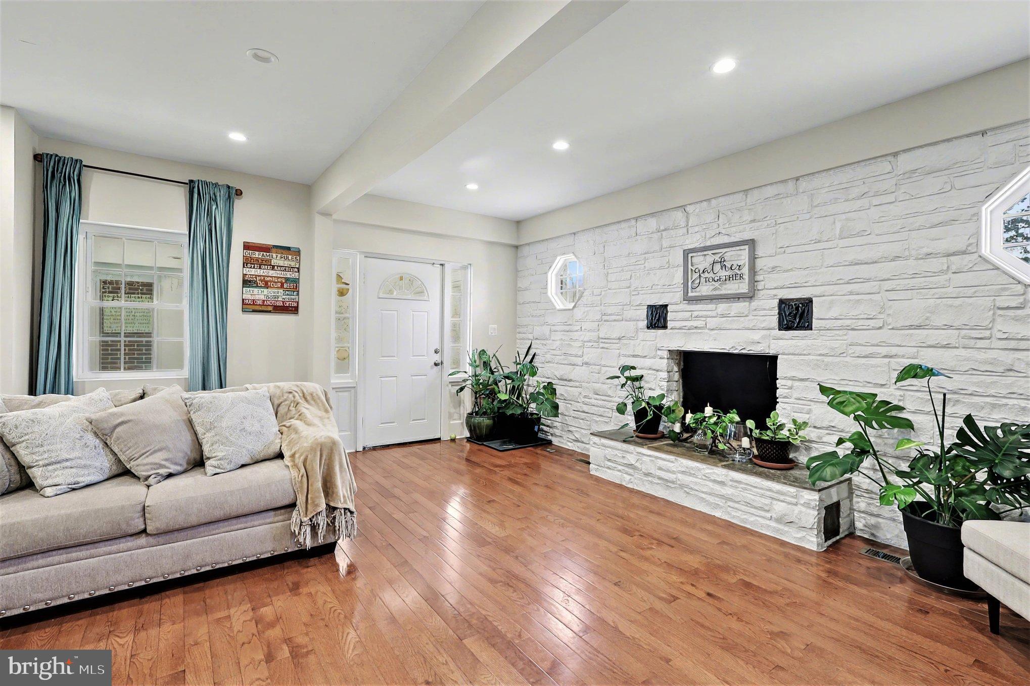 16600 Bald Eagle School Road Brandywine, MD 20613 - Photo 5 of 29 a living room with furniture and a fireplace