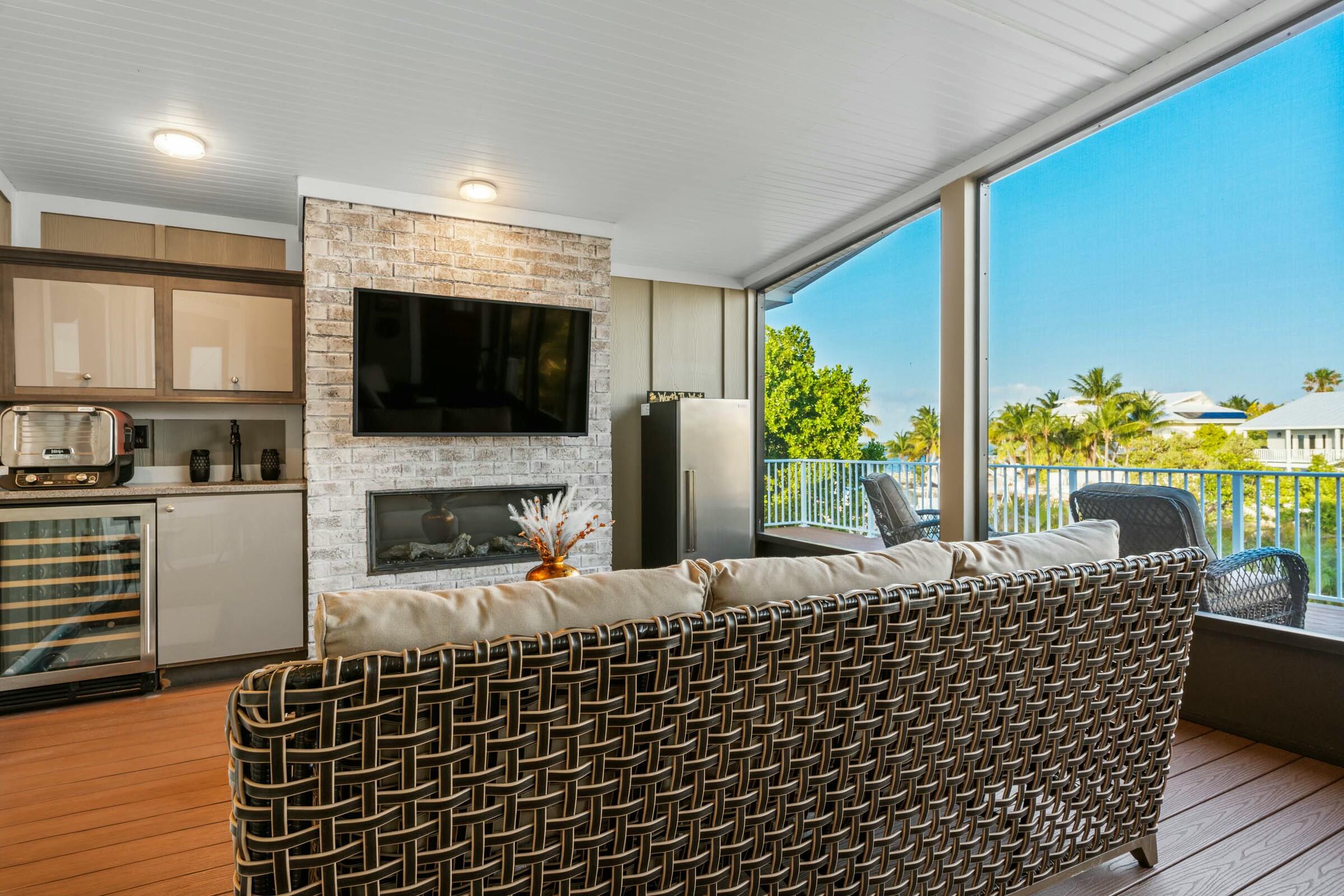 17346 Keystone Road Sugarloaf, FL 33042 - Photo 22 of 59 a living room with furniture and a flat screen tv