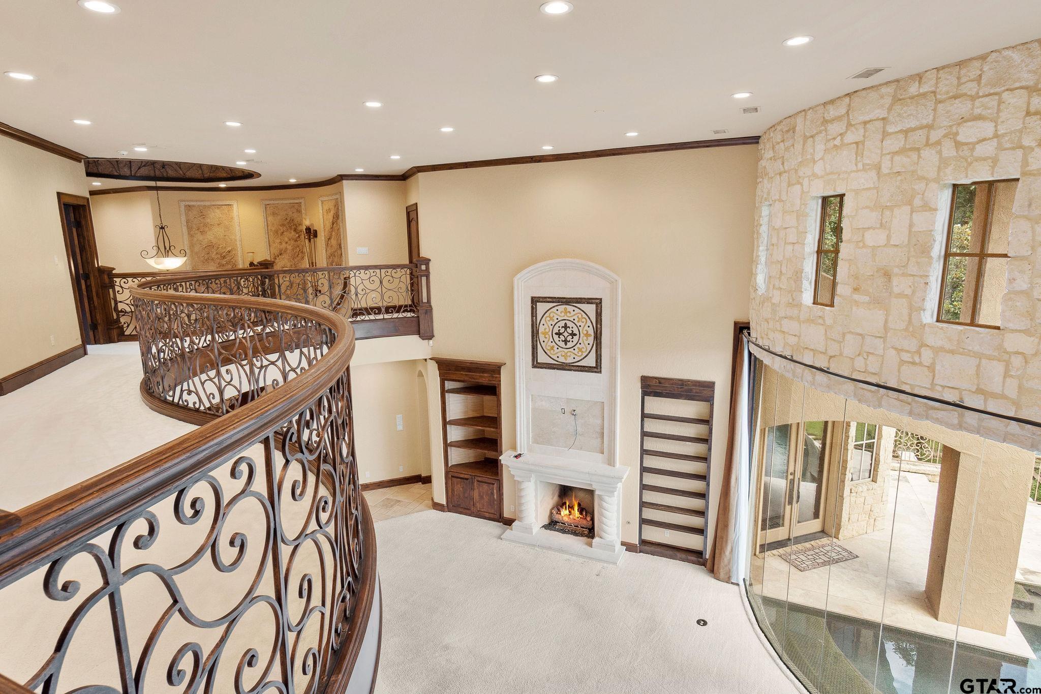 4331 Mark Hayes Court Tyler, TX 75709 - Photo 39 of 48 a view of a hallway with stairs