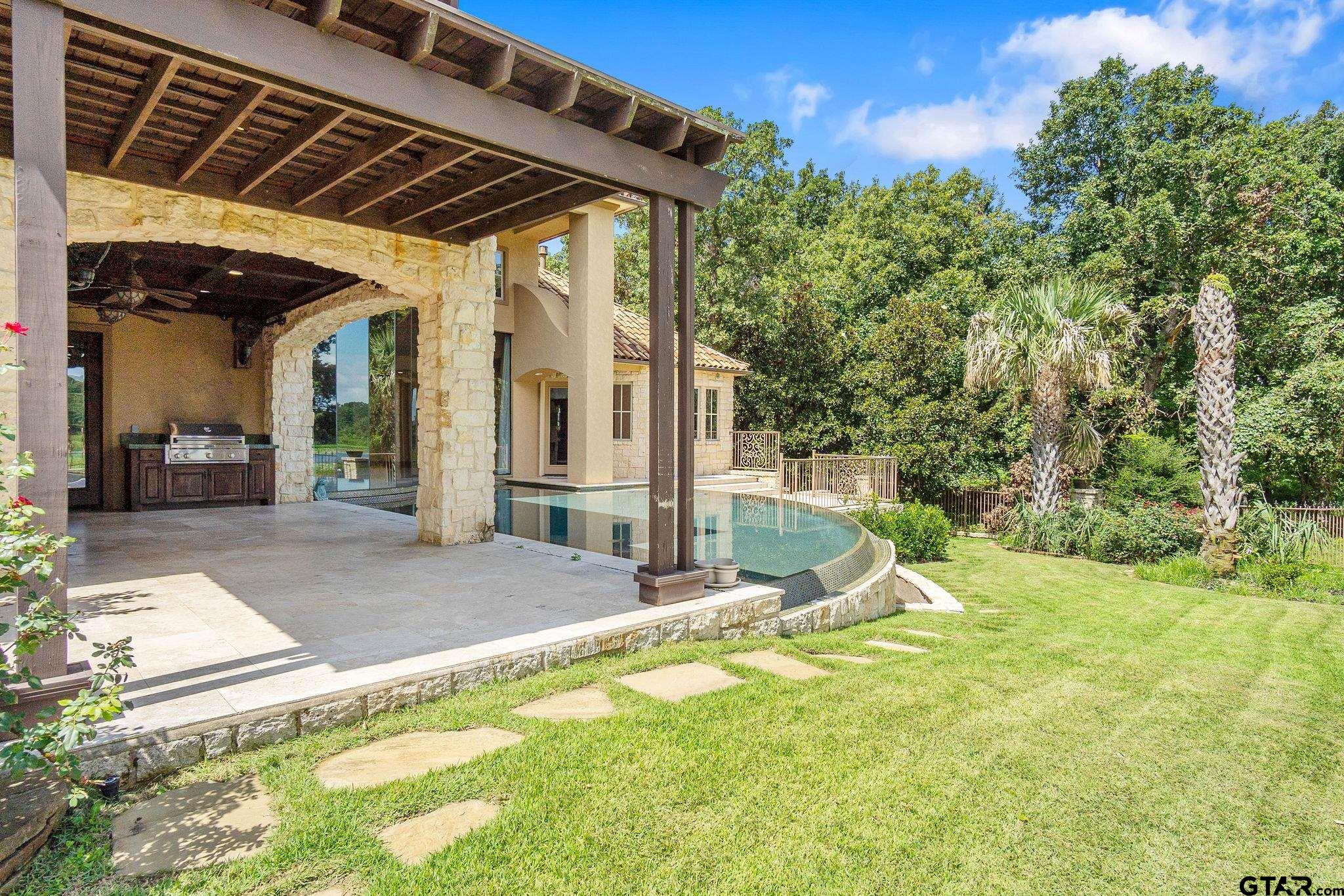 4331 Mark Hayes Court Tyler, TX 75709 - Photo 45 of 48 a view of outdoor space yard and patio