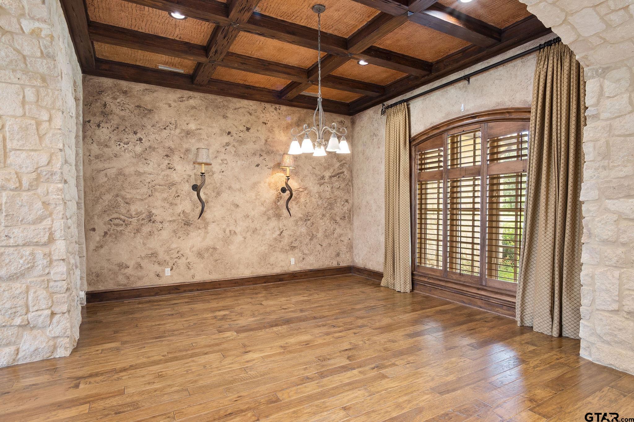4331 Mark Hayes Court Tyler, TX 75709 - Photo 10 of 48 a view of empty room with wooden floor and fan